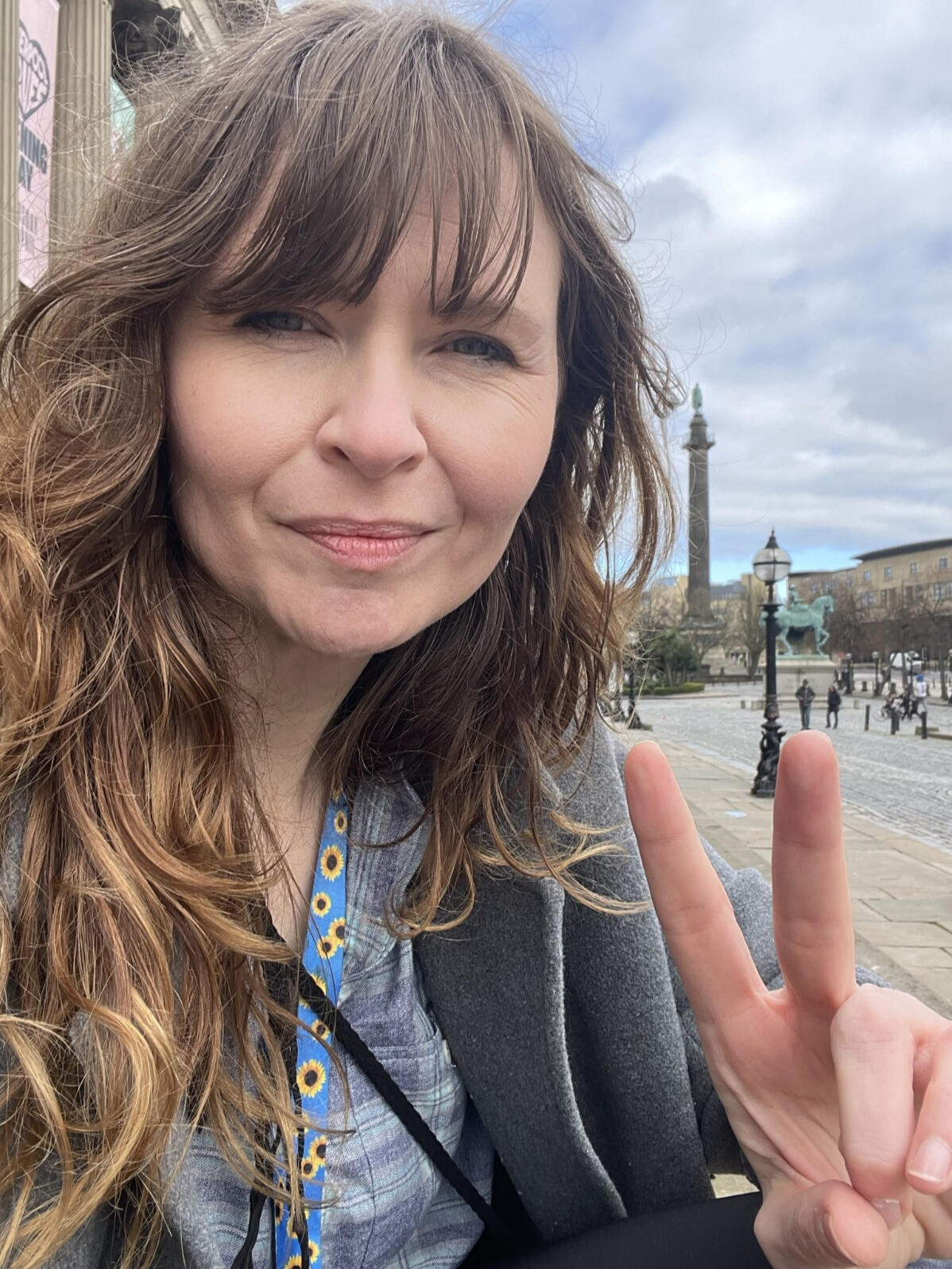 J. Friday J. Friday sat in front of St. George's Hall in Liverpool